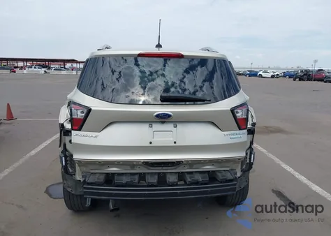 2017 Ford Escape Titanium z USA, uszkodzony, nr VIN 1FMCU0JD7HUD84006
